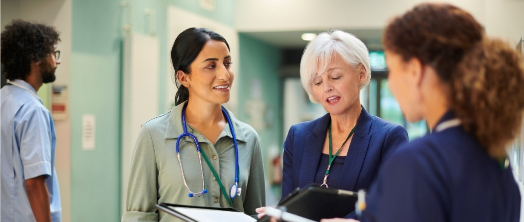 medical professionals gathered in discussion