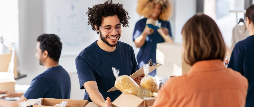 community checking image of non-profit preparing donations