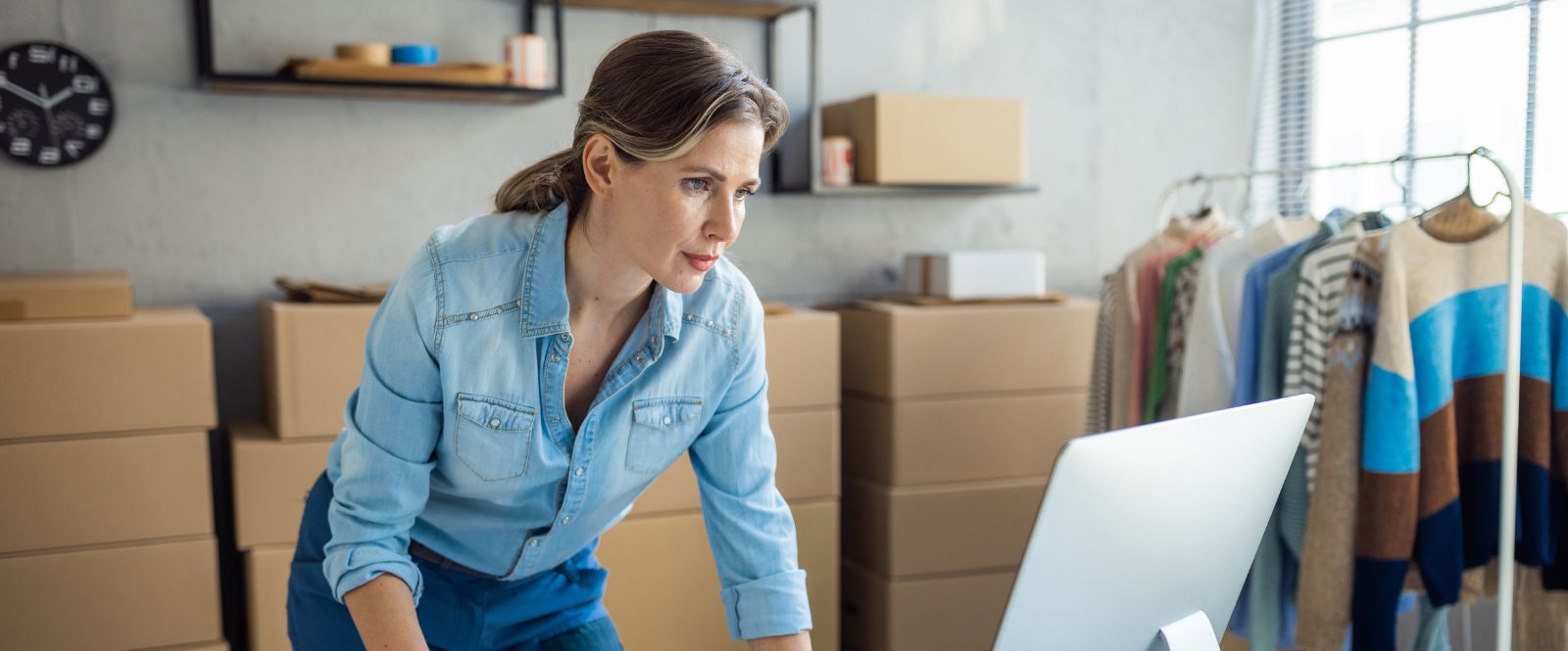Small business woman looking at her computer