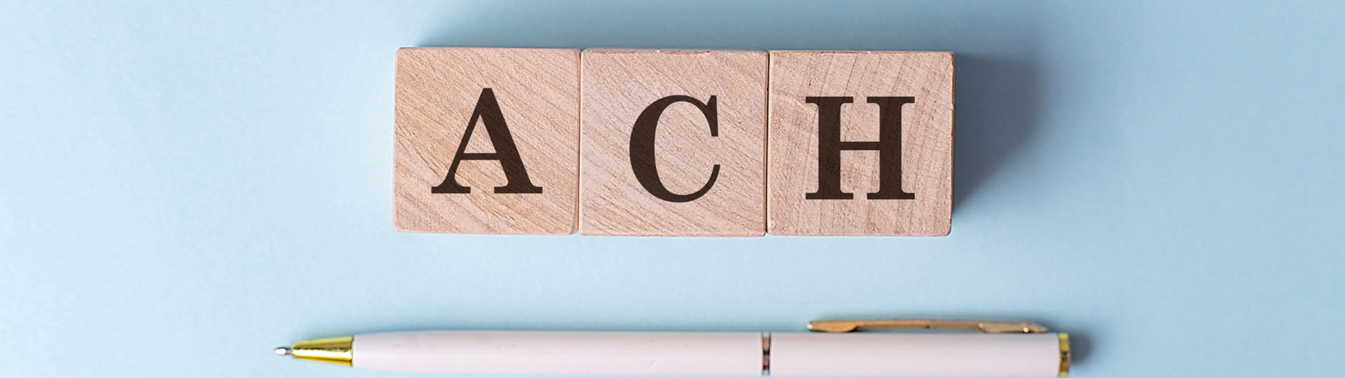 Tiles spelling ACH.
